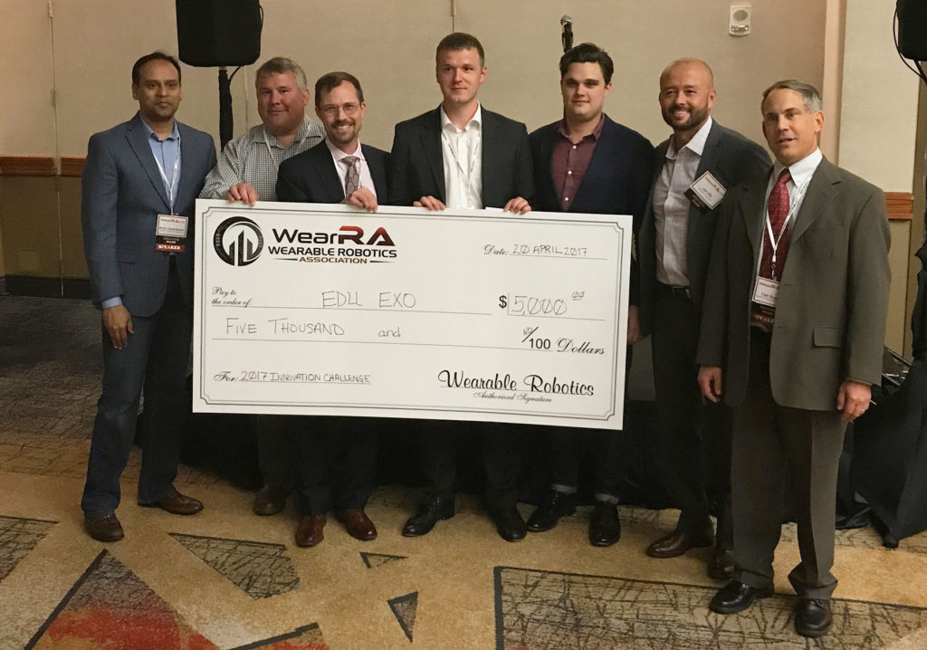 The WearRA Leadership Team and Sean Petterson from StrongArm Technologies present the main prize to EduExo