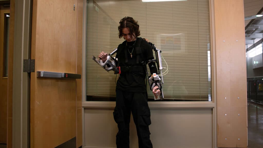 Lucas with Upper Body segment of ARX High School Exoskeleton Credit coulter